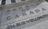 加拿大央行继续把基准利率维持在历史低位